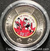 Reverse side showing coloured hockey design and denomination