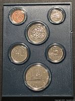 Front view of 6-coin specimen set showing reverse designs