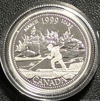 Reverse: March 1999 scene of figure poling boat on river, encapsulated