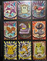 Fronts of nine Topps Pokémon cards in sleeve