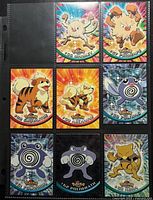 Fronts of nine Pokémon Topps cards in binder sleeve