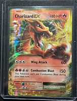 Front view of Charizard EX 180 HP card showing artwork and details