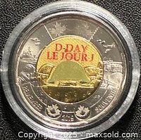 Reverse of coin showing D-Day LE JOUR J design with colour