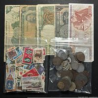 Overview of 5 banknotes, bag of mixed coins, bag of mixed stamps