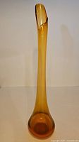 Full view of 28" amber swung glass vase