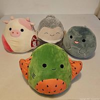 Front view of all four Squishmallows