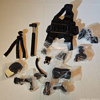 Overall view of GoPro accessories spread on surface