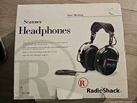 Front of original box showing RadioShack scanner headphones model 33-1198