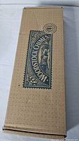 Closed retail box marked Woodstock Chimes