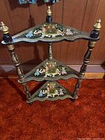 Overall view of three-tier hand-painted wooden corner shelf