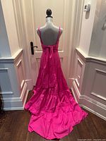 Back view with tie and tiered skirt detail