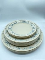 Stack of three sizes of matching Corelle plates