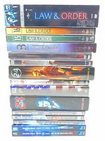 Stack of all DVD box sets showing titles and seasons