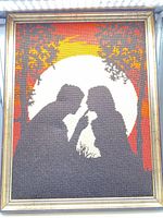 Full view of framed needlepoint artwork