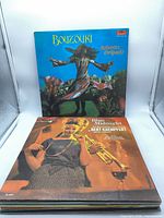 Front cover of Bouzouki by Roberto Delgado and Blue Midnight by Bert Kaempfert atop stack