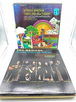 Front covers of Baroque Masters and The Weavers LPs