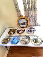 Group shot of all eight plates on table