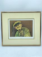 Front view of framed signed print