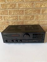 Front view of Onkyo A-RV400 receiver showing controls and display