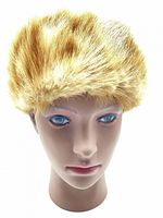 Front view of golden brown real fur hat on mannequin