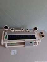 Front view of Blue Man Group electronic keyboard