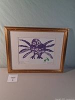 Full view of framed Purple Owl print in gold frame