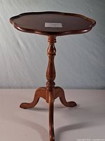 Full view of wooden pedestal side table