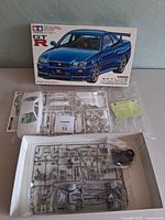 Box art and unassembled kit contents displayed