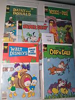 All five Whitman Disney comics bagged