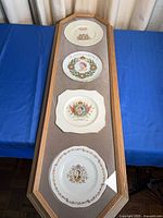 Full view of frame with four plates mounted