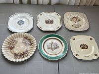 All six commemorative plates laid out for overview