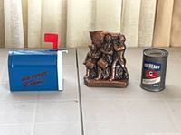 All three piggy banks side-by-side for scale and variety