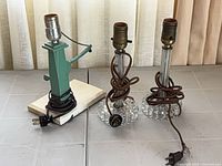 All three lamps upright showing cords and sockets