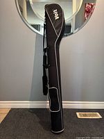 Full view of Voit golf club carrying case standing upright