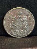 Reverse side showing Canadian coat of arms