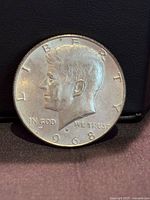 Obverse of 1968-D Kennedy half dollar