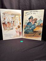 Full view of both watercolour boards standing side by side