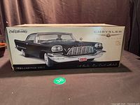 Front of boxed Ertl 1957 Chrysler 300C model