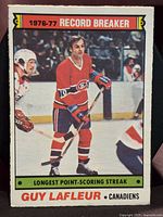 Front of card showing player image and Record Breaker title