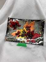 front view showing maple leaf artwork and Canada script