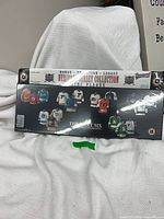 Front view of sealed Heritage Jersey Collection plaque showing six miniature jerseys