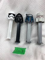 Four Star Wars Pez dispensers lined up