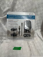 Front of sealed Ubiolabs Universal Wireless Charging Car Mount package showing all contents