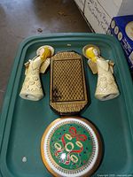 Two angels, black lacquered music box, Mikasa round music box