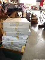 Stack of seven Goebel Hummel annual plate boxes 1981-1987