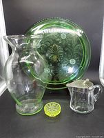 Group shot of vase, cake plate, syrup pitcher, salt cellar