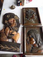 All three wood plaques on table