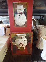 Two boxed Lenox holiday porcelain pieces