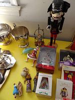 Overall view of nutcracker and assorted ornaments on table