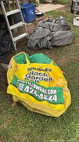 Overall view of the BigYellowBag bulk bag lying on grass